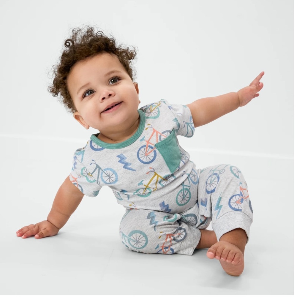 Little Sleepies Pocket Pant Romper in Let’s Ride NWOT